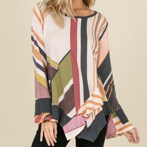 ASYMMETRICAL TOP W/RUFFLE HEM